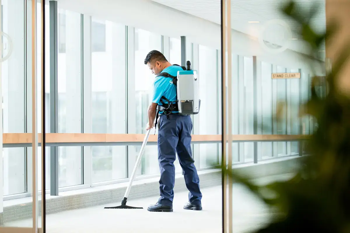 professional carpet cleaner cleaning a carpet