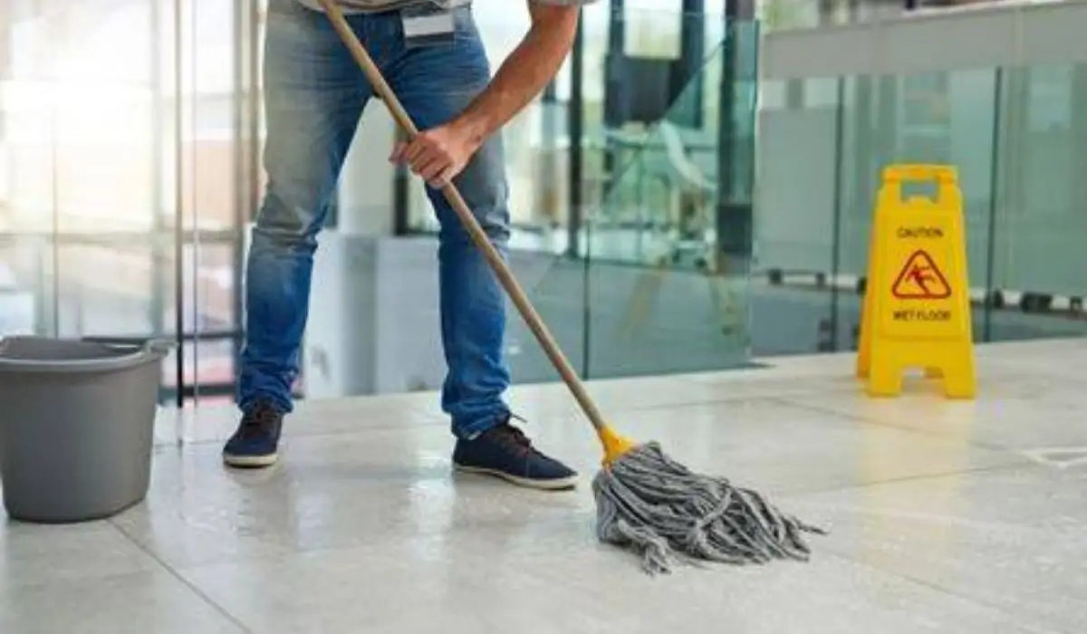commercial cleaning service, man mopping the floor
